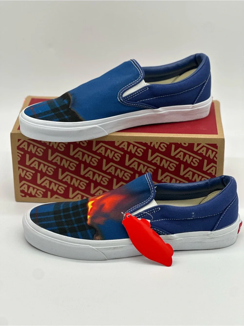 Vans Blue Plaid Slip-On Sneakers with Orange Accent